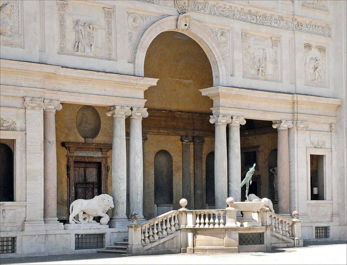 Villa Medici’s garden loggia, with a central rounded arch, paired columns and ancient reliefs