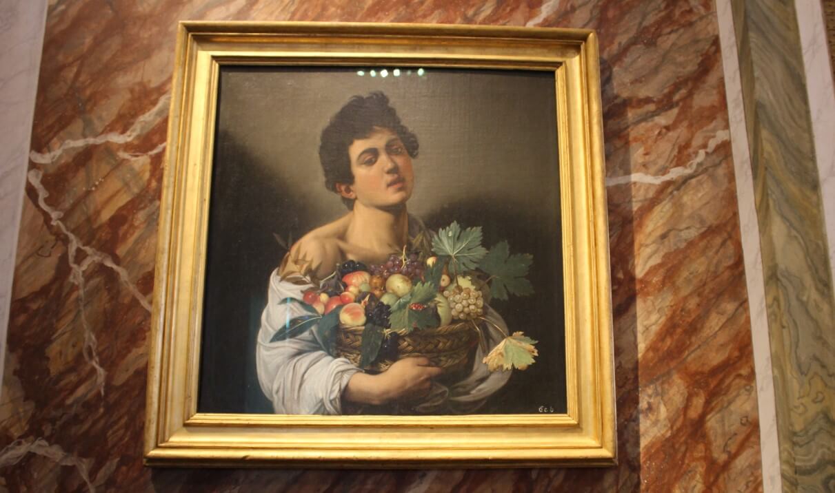 The boy with a basket of fruit caravaggio