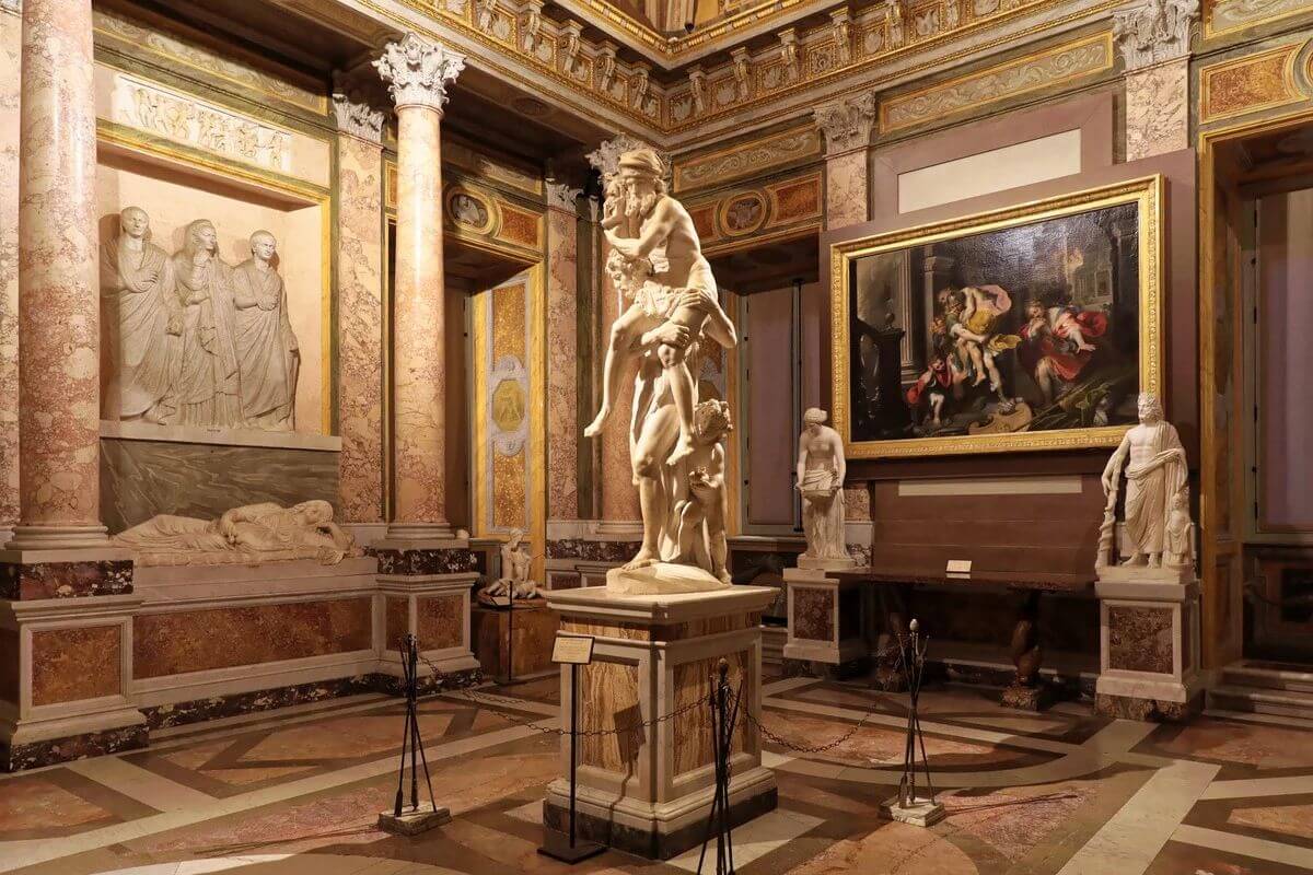 Bernini’s Aeneas carrying Anchises, with Ascanius beside them, in the Borghese Gallery.