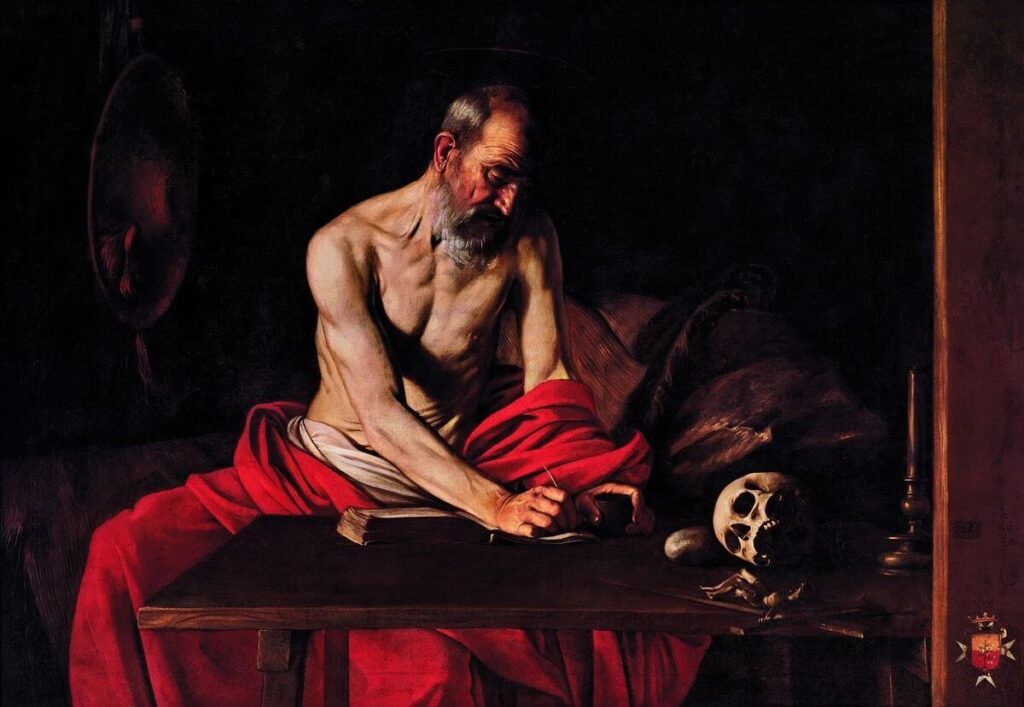 Caravaggio’s Valletta Saint Jerome Writing, with a skull and candlestick at the right and a red hat at the left